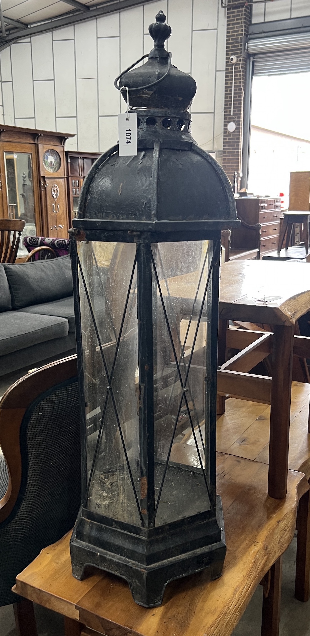 A painted hexagonal metal garden lantern, height 112cm
